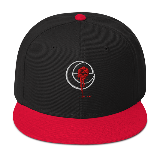 Black and red The Damned Snapback hat with embroidered sigil, structured high-profile fit, and flat red brim with grey under visor